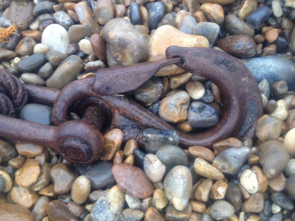 Rust on the beach - metal chain