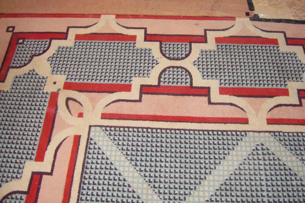 Original woven carpet from the entrance to the theatre