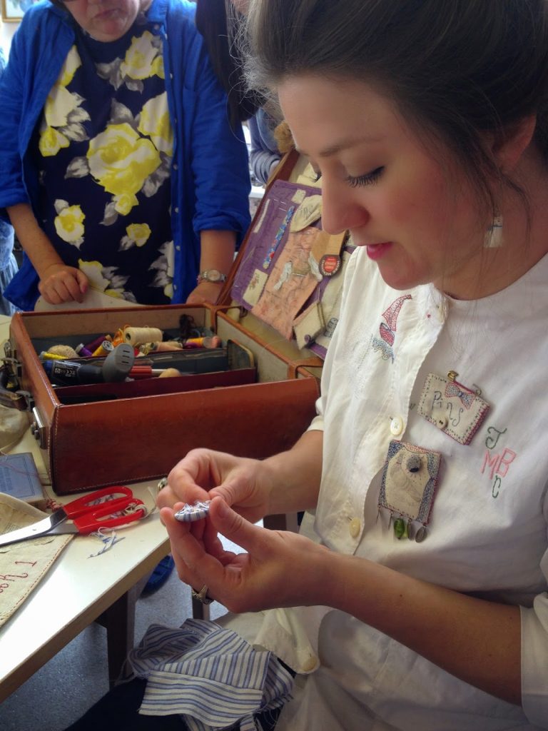 Jessie Chorley Stitching a button