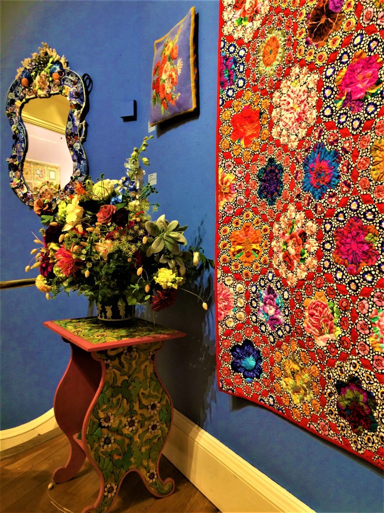 Kaffe Fassett quilt and mosaic mirror