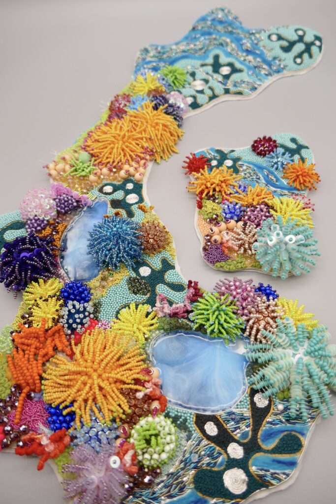 Heavily beaded collar inspired by the textures and colours of the Coral Reefs.