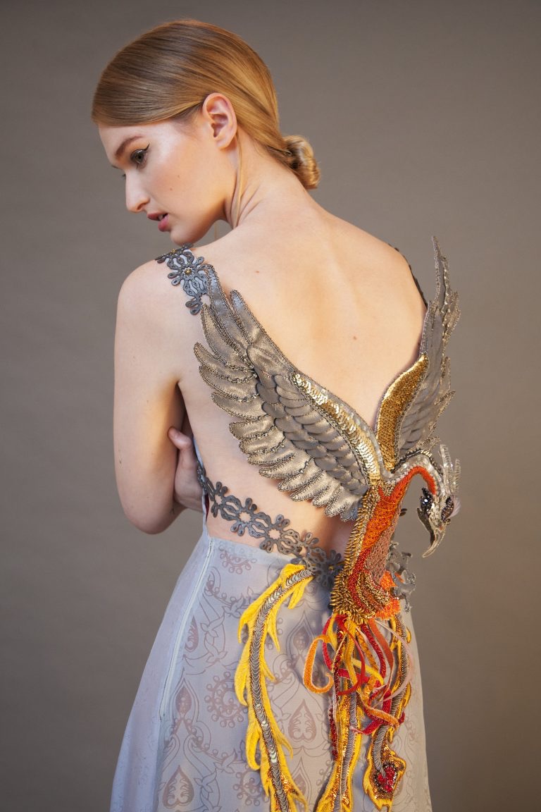 'Rising from the Ashes' couture dress created by Claire Edwards. The Phoenix is all hand beaded.