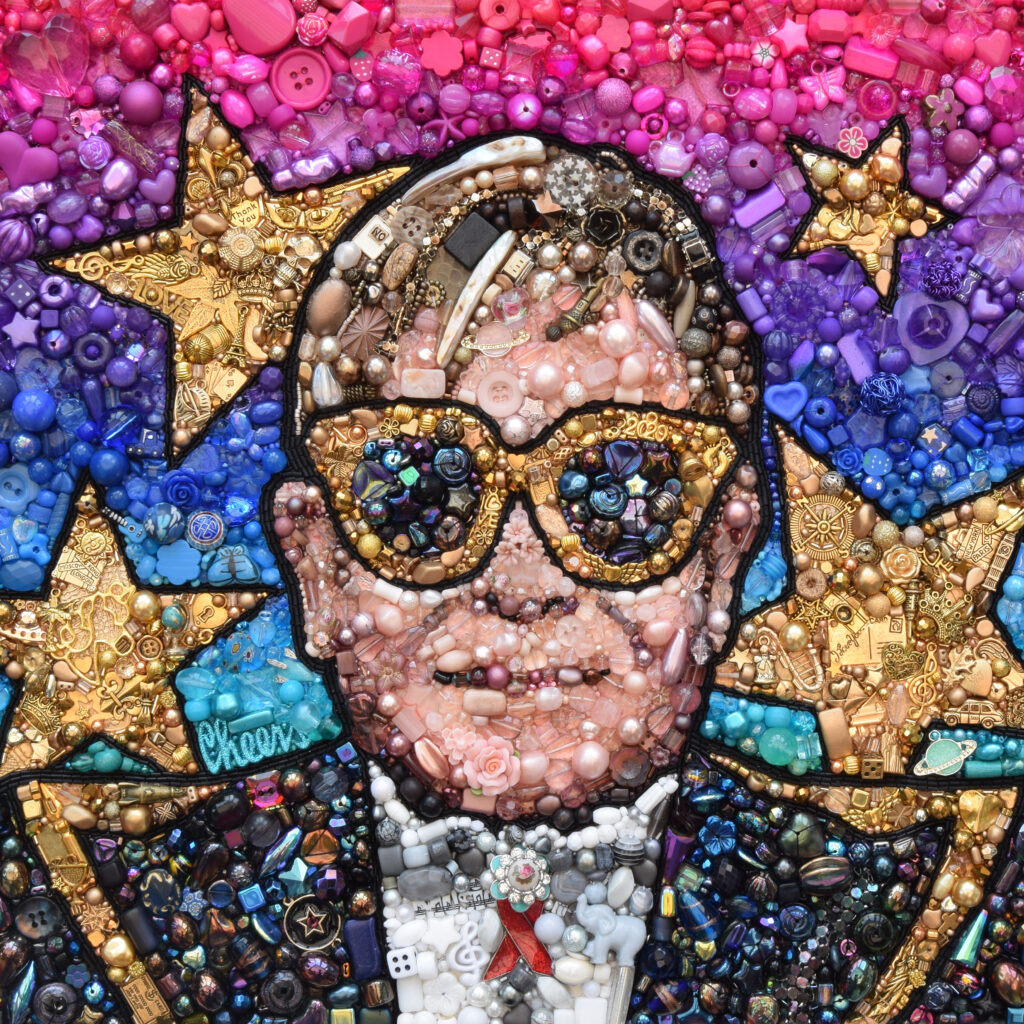 Hand beaded and hand embroidered image of Elton John by artist Sarah Gwyer