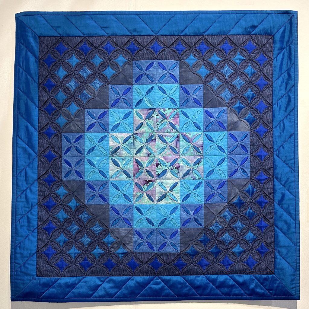 Cathedral window quilt by Lynne Edwards